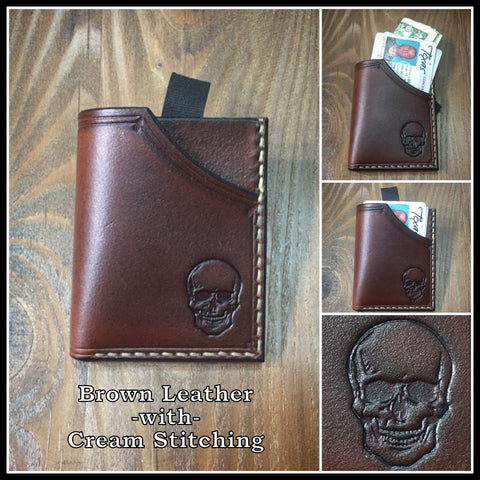 Handmade full grain leather front pocket minimalist wallet with skull stamped on it.
